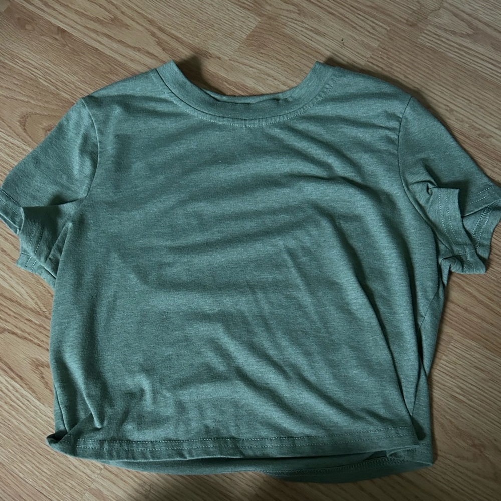 green cropped top
